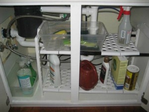 https://www.home-storage-solutions-101.com/image-files/xunder-sink-shelf-organizer-kitchen-cabinet-organization.jpg.pagespeed.ic.BXuECcn8NO.jpg