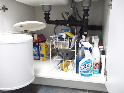 https://www.home-storage-solutions-101.com/images/are-you-ready-a-clutter-free-under-kitchen-sink-cabinet-21842929.jpg