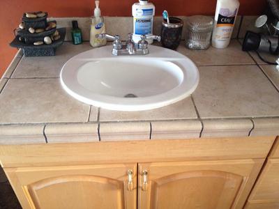 I would LOVE any advice on how to organize our bathroom sink area!! So  embarrassing…our sink area has no wall space but we have all this countertop  between two sinks so shit