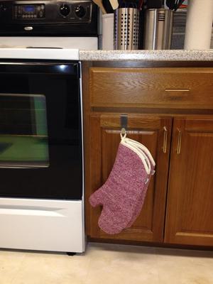 Oven Mitts and Pot Holders Need a Home In Your Kitchen—Here's How