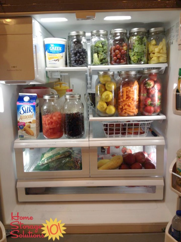 Beautiful, clean and organized fridge with wood and glass storage