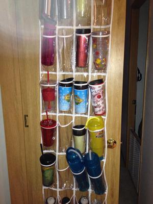 https://www.home-storage-solutions-101.com/images/simple-water-bottle-organization-hack-use-an-over-the-door-shoe-organizer-21805773.jpg
